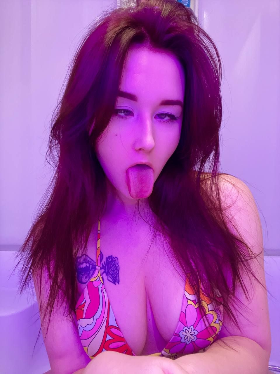angel_rainbow_peach making an ahegao face, wearing a bikini
